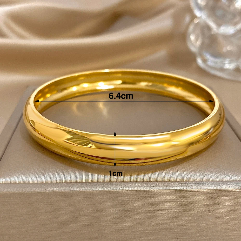 Luxe Twist Gold Bangle